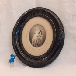 Antique black oval frame,...