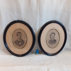 Pair of antique black oval...